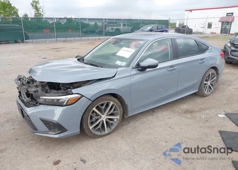 2022 Honda Civic Touring z USA, uszkodzony, nr VIN 2HGFE1F94NH313631